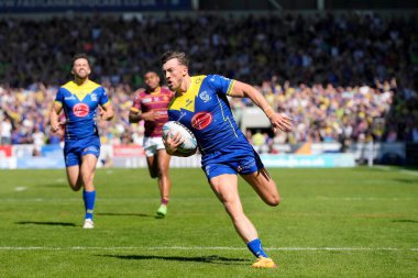 Warrington Wolves 'tan Matty Ashton, 19 Mayıs 2024' te Birleşik Krallık 'ın Wicked Stadyumu' nda oynanan ve Huddersfield Giants 'ın Warrington Wolves' a karşı oynadığı Betfred Challenge Kupası yarı final maçında gol atmak için ayrıldı.