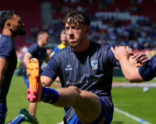 stock image Matty Ashton of Warrington Wolves warms up before the Betfred Challenge Cup Semi-Final match Huddersfield Giants vs Warrington Wolves at Totally Wicked Stadium, St Helens, United Kingdom, 19th May 2024