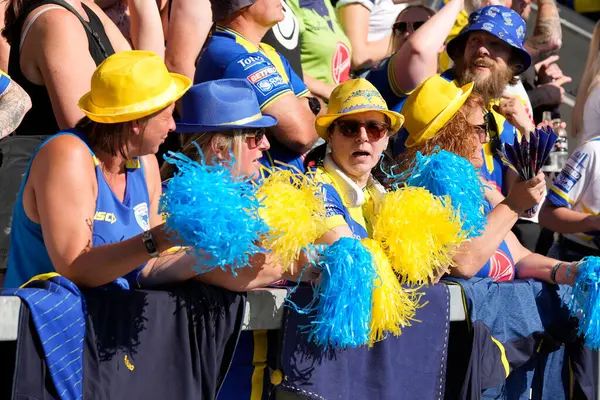 stock image Warrington Wolves fans cheer on their side during the Betfred Challenge Cup Semi-Final match Huddersfield Giants vs Warrington Wolves at Totally Wicked Stadium, St Helens, United Kingdom, 19th May 2024