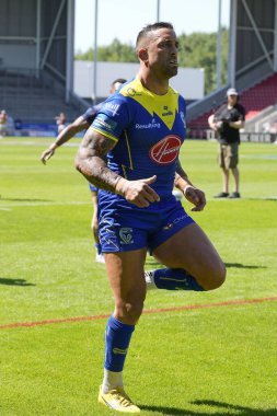 Warrington Wolves 'tan Paul Vaughan, 19 Mayıs 2024' te İngiltere 'nin St. Helens kentinde oynanan ve Wicked Stadyumu' nda oynanan yarı final karşılaşması Huddersfield Giants 'a karşı Warrington Wolves maçından önce ısınıyor.
