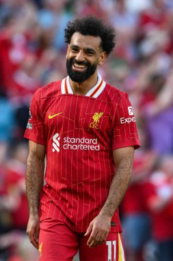 Liverpool 'dan Muhammed Salah, 19 Mayıs 2024' te Anfield, Liverpool 'da oynanan Premier Lig karşılaşmasında Wolverhampton Wanderers' a karşı gülümsüyor. 