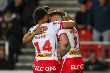 St. Helens takımından Jack Welsby, 24 Mayıs 2024 'te St Helens-Leeds Stadyumu' nda oynanan 12. Betfred Süper Lig karşılaşmasında denemesini kutluyor. 