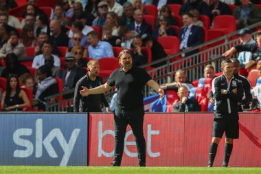 Leeds United 'ın teknik direktörü Leeds United, 26 Mayıs 2024' te Wembley Stadyumu 'nda Leeds United ile Southampton arasındaki play-off final maçında tepki gösterdi. 