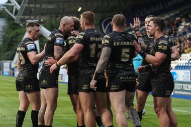Leoparlar 'dan Josh Charnley, 24 Mayıs 2024' te İngiltere 'nin Huddersfield Stadyumu' nda oynanan 12. Betfred Süper Lig karşılaşmasında Huddersfield Giants - Leigh Leopards karşılaşmasını kutluyor. 