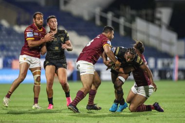 Leigh Leopar takımından Edwin Ipape, 24 Mayıs 2024 'te John Smith' in Stadyumu 'nda oynanan Betfred Süper Lig karşılaşmasında Huddersfield Giants - Leigh Leopards maçında Huddersfield Giants' dan Ashton Golding tarafından yenildi. 