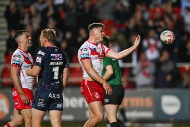 St. Helens takımından Jack Welsby, 24 Mayıs 2024 'te St Helens-Leeds Stadyumu' nda oynanan 12. Betfred Süper Lig karşılaşmasında denemesini kutluyor. 