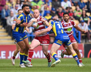 Wigan Warriors 'dan Liam Marshall, 1 Haziran 2024' te Warrington, İngiltere 'deki Halliwell Jones Stadyumu' nda oynanan Betfred Süper Lig 13. Raundu 'nda Warrington Wolves - Wigan Warriors maçında Warrington Wolves' dan Matty Nicholson tarafından yenildi.
