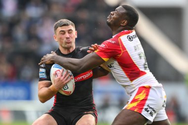 Lewis Dodd of St. Helens is tackled by Jordan Dezaria of Catalan Dragons during the Betfred Super League Round 13 match St Helens vs Catalans Dragons at Totally Wicked Stadium, St Helens, United Kingdom, 31st May 2024 clipart