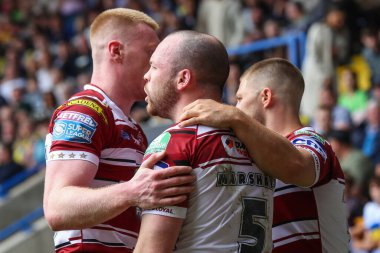 Wigan Warriors 'dan Liam Marshall, 1 Haziran 2024' te İngiltere 'nin başkenti Warrington' da oynanan 13. Betfred Süper Lig maçı Warrington Wolves vs Wigan Warriors maçında 12-10 'luk galibiyetini kutluyor.