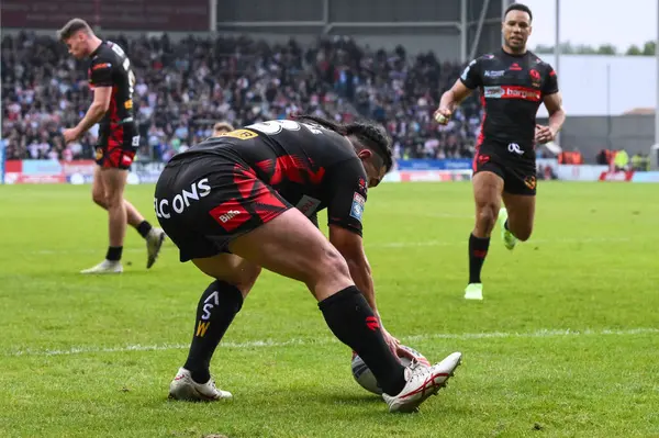 Stock image Konrad Hurrell of St. Helens scores a try during the Betfred Super League Round 13 match St Helens vs Catalans Dragons at Totally Wicked Stadium, St Helens, United Kingdom, 31st May 2024