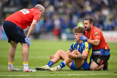 Arron Lindop, 13. Betfred Süper Lig karşılaşmasında Halliwell Jones Stadyumu 'nda Warrington Wolves' a karşı Wigan Warriors maçında tedavi gördü.