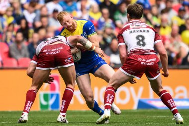 Warrington Wolves 'tan Joe Bullock, Wigan Warriors' tan Kaide Ellis tarafından 8 Haziran 2024 'te Wembley Stadyumu' nda oynanan Betfred Challenge Cup final maçında yenildi. 