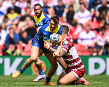 Warrington Wolves 'tan Matty Ashton, Wigan Warriors' tan Brad ONeill tarafından 8 Haziran 2024 'te Wembley Stadyumu' nda oynanan Betfred Challenge Cup final maçında yenildi. 