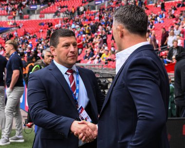 Sam Burgess Warrington Wolves 'un baş antrenörü ve Matt Peet Wigan Warriors' un baş antrenörü, 8 Haziran 2024 'te Wembley Stadyumu' nda oynanan Warrington Wolves vs Wigan Warriors karşılaşması öncesinde yaptıkları görüşmede Wigan Warriors 'la konuştular. 