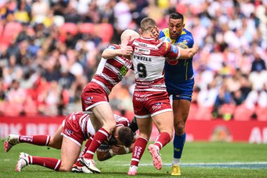 Warrington Wolves 'tan Paul Vaughan, Wigan Warriors' tan Brad ONeill tarafından 8 Haziran 2024 'te Wembley Stadyumu' nda oynanan Betfred Challenge Cup final maçında yenildi. 