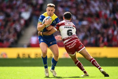 Warrington Wolves 'dan George Williams, 8 Haziran 2024' te Wembley Stadyumu 'nda oynanan Betfred Challenge Cup final maçında Bevan French of Wigan Warriors tarafından yenildi. 