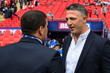Sam Burgess Warrington Wolves 'un baş antrenörü ve Matt Peet Wigan Warriors' un baş antrenörü, 8 Haziran 2024 'te Wembley Stadyumu' nda oynanan Warrington Wolves vs Wigan Warriors karşılaşması öncesinde yaptıkları görüşmede Wigan Warriors 'la konuştular. 