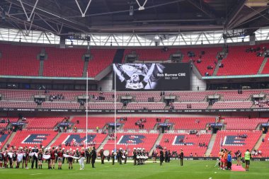 Rob Burrows 'a yapılan haraç, 8 Haziran 2024' te Wembley Stadyumu 'nda oynanan Betfred Kadınlar Kupası final maçı Leeds Rhinos' a karşı St Helens maçı öncesinde verilmiştir.