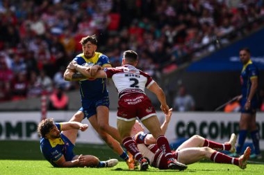 Warrington Wolves 'tan Matty Ashton, Wigan Warriors' tan Abbas Miski tarafından 8 Haziran 2024 'te Wembley Stadyumu' nda oynanan Betfred Challenge Cup final maçında yenildi. 
