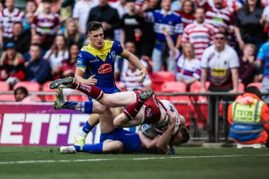 Wigan Warriors 'tan Liam Farrell, 8 Haziran 2024' te Wembley Stadyumu 'nda oynanan Betfred Challenge Cup final maçında skoru 2-16' ya çıkarmaya çalışıyor. 