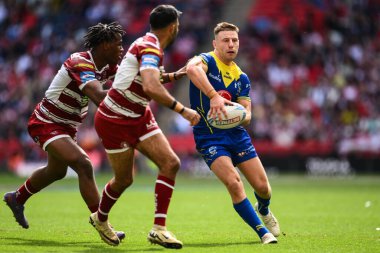 Warrington Wolves 'tan George Williams, 8 Haziran 2024' te Wembley Stadyumu 'nda oynanan Warrington Wolves vs Wigan Warriors final maçında pas attı. 