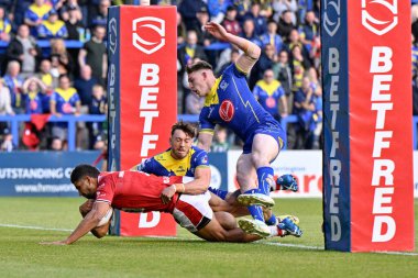 Salford Red Devils takımından Nene Macdonald, 14 Haziran 2024 'te Halliwell Jones Stadyumu' nda oynanan 14. Warrington Wolves - Salford Red Devils maçında Salford 'u 0-4 yenmeye çalışıyor. 