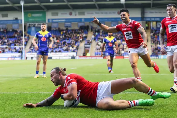 stock image Chris Hankinson goes over for a try and makes the score 0-23 but is later ruled out during the Betfred Super League Round 14 match Warrington Wolves vs Salford Red Devils at Halliwell Jones Stadium, Warrington, United Kingdom, 14th June 2024