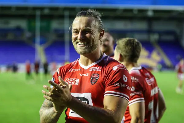 stock image Chris Hankinson of Salford Red Devils celebrates his teams win after the Betfred Super League Round 14 match Warrington Wolves vs Salford Red Devils at Halliwell Jones Stadium, Warrington, United Kingdom, 14th June 2024 