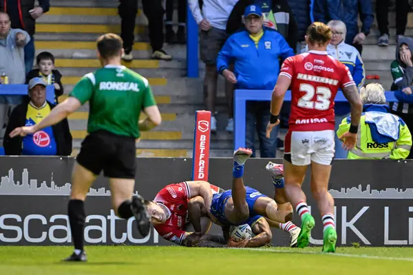 stock image Rodrick Tai of Warrington Wolves goes over for a try to make it 4-19 during the Betfred Super League Round 14 match Warrington Wolves vs Salford Red Devils at Halliwell Jones Stadium, Warrington, United Kingdom, 14th June 2024 