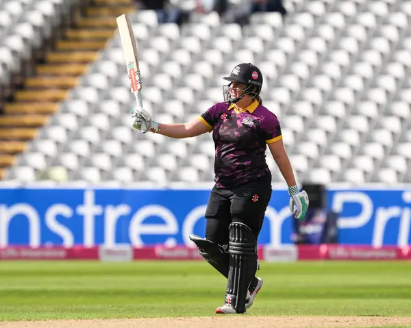 stock image Abbey Freeborn of Central Sparks celebrates a half century (50 runs) during the Charlotte Edwards Cup match Central Sparks vs Lancashire Thunder at Edgbaston, Birmingham, United Kingdom, 14th June 2024 