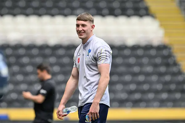 Stock image Matty Nicholson of Warrington Wolves inspects the pitch ahead of the Betfred Super League Round 15 match Hull FC vs Warrington Wolves at MKM Stadium, Hull, United Kingdom, 22nd June 2024 