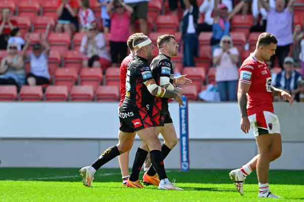 stock image Mark Percival of St. Helens celebrates his try to make it 14-18 St Helens during the Betfred Super League Round 15 match Salford Red Devils vs St Helens at Salford Community Stadium, Eccles, United Kingdom, 23rd June 2024 