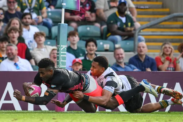 stock image Epeli Momo of Fiji goes over for a try and makes the score 31-22 during the Killik Cup match Barbarians vs Fiji at Twickenham Stadium, Twickenham, United Kingdom, 22nd June 202