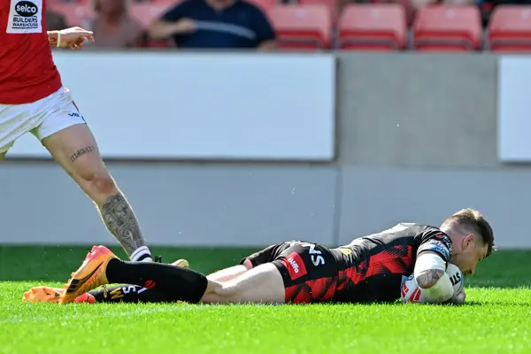 stock image Mark Percival of St. Helens goes over for a try to make it 14-18 St Helens during the Betfred Super League Round 15 match Salford Red Devils vs St Helens at Salford Community Stadium, Eccles, United Kingdom, 23rd June 2024 