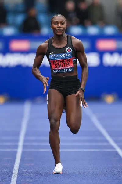 stock image Dina Asher-Smith leads the women's 200m final during the Microplus UK Athletics Championships Day 2 at Manchester Regional Arena, Manchester, United Kingdom, 30th June 2024 