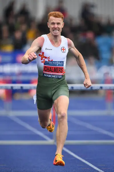 stock image Alastair Chalmers leads in 400m hurdles during the Microplus UK Athletics Championships Day 2 at Manchester Regional Arena, Manchester, United Kingdom, 30th June 2024 