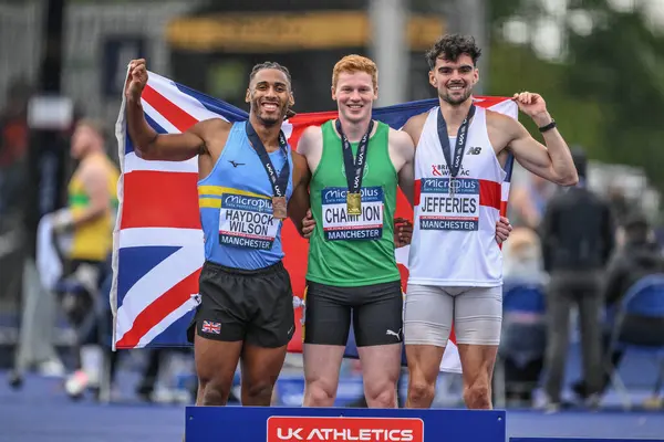 stock image Alex Haydock-Wilson, Charlie Dobson and Ben Jeffries on the podium for the men's 400m final during the Microplus UK Athletics Championships Day 2 at Manchester Regional Arena, Manchester, United Kingdom, 30th June 2024 