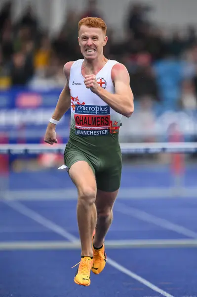 stock image Alastair Chalmers leads in 400m hurdles during the Microplus UK Athletics Championships Day 2 at Manchester Regional Arena, Manchester, United Kingdom, 30th June 2024 