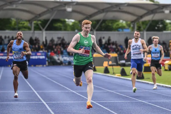 stock image Charlie Dobson wins the men's 400m final and gets a place at the Olympics during the Microplus UK Athletics Championships Day 2 at Manchester Regional Arena, Manchester, United Kingdom, 30th June 2024 