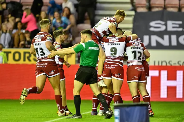 stock image Bevan French of Wigan Warriors celebrates his try to make it 16-6 Wigan during the Betfred Super League Round 16 match Wigan Warriors vs Leigh Leopards at DW Stadium, Wigan, United Kingdom, 5th July 2024 