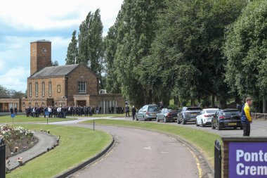 Rob Burrow CBE makes his final journey as his funeral car enters Pontefract Crematorium during Rob Burrow CBE Funeral at Pontefract Crematorium, Pontefract, United Kingdom, 7th July 2024  clipart