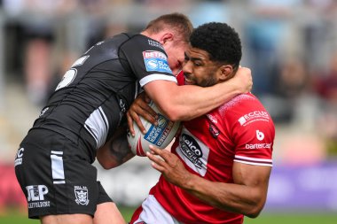 Kallum Watkins of Salford Red Devils is tackled by Jordan Lane Hull FC during the Betfred Super League Round 16 match Salford Red Devils vs Hull FC at Salford Community Stadium, Eccles, United Kingdom, 7th July 2024  clipart