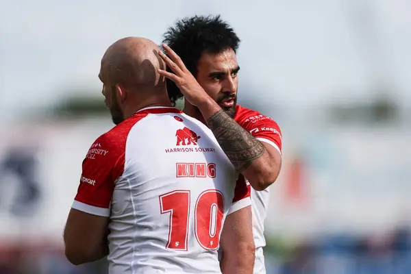 stock image Tyrone May of Hull KR pats George King of Hull KR win the head after a good set during the Betfred Super League Round 16 match Hull KR vs Catalans Dragons at Sewell Group Craven Park, Kingston upon Hull, United Kingdom, 6th July 2024 