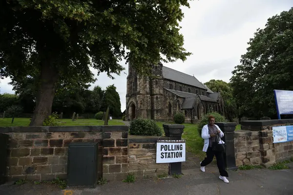 stock image Voters leave the polling station at ST Pauls Church in Barnsley during the 2024 United Kingdom elections in the Barnsley area, Barnsley, United Kingdom, 4th July 2024