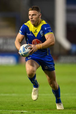 Warrington Wolves 'tan George Williams, 17. Betfred Süper Lig karşılaşmasında Warrington Wolves, Leeds Gergedan' a karşı Halliwell Jones Stadyumu, Warrington, İngiltere 'de 11 Temmuz 2024' te oynanan karşılaşmada ilk hamlesini yaptı. 