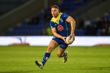 Warrington Wolves 'tan George Williams, 17. Betfred Süper Lig karşılaşmasında Warrington Wolves, Leeds Gergedan' a karşı Halliwell Jones Stadyumu, Warrington, İngiltere 'de 11 Temmuz 2024' te oynanan karşılaşmada ilk hamlesini yaptı. 