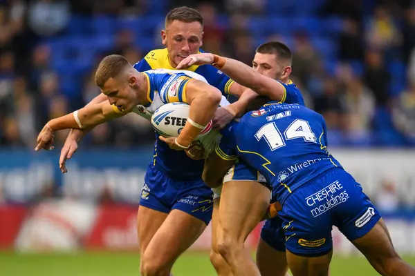 Leeds Rhinos takımından Ash Handley, Rodrick Tai, Ben Currie, Warrington Wolves 'tan Danny Walker, 17. Betfred Süper Lig karşılaşmasında Warrington Wolves, Leeds Rhinos' a karşı Halliwell Jones Stadyumu, Warrington, İngiltere, 11 Temmuz 2024 