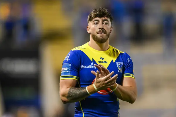 stock image Matty Ashton of Warrington Wolves applauds the fans at the end of the Betfred Super League Round 17 match Warrington Wolves vs Leeds Rhinos at Halliwell Jones Stadium, Warrington, United Kingdom, 11th July 2024 