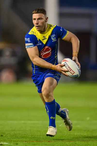 stock image George Williams of Warrington Wolves makes a break during the Betfred Super League Round 17 match Warrington Wolves vs Leeds Rhinos at Halliwell Jones Stadium, Warrington, United Kingdom, 11th July 2024 