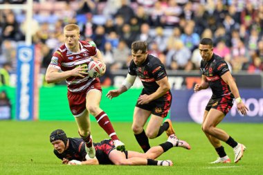 Zach Eckersley of Wigan Warriors breaks forwards with the ball during the Betfred Super League Round 17 match Wigan Warriors vs St Helens at DW Stadium, Wigan, United Kingdom, 12th July 2024  clipart